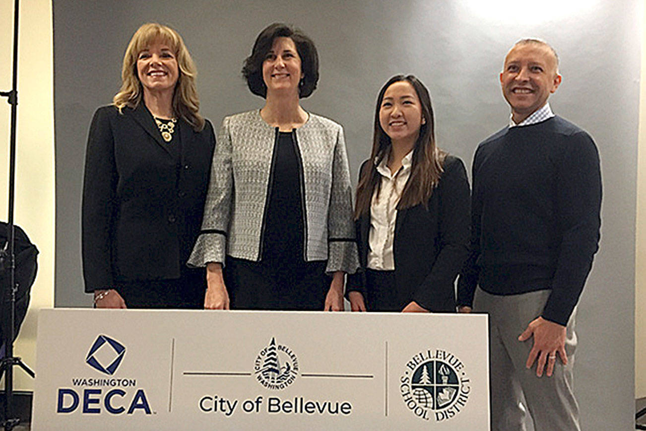 From left: Washington DECA executive leader Lori Hairston, Bellevue deputy mayor Lynne Robinson, Interlake High School student Olivia Sun, and Bellevue School District superintendent Ivan Duran.