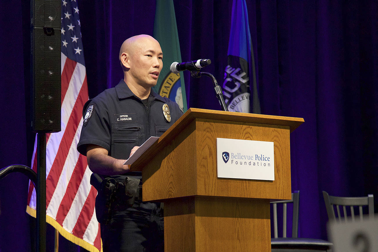 Ashley Hiruko / staff photo                                 Bellevue police officer Craig Hanaumi accepts the award named after him during the Bellevue Police Foundation’s fundraising breakfast on March 15.