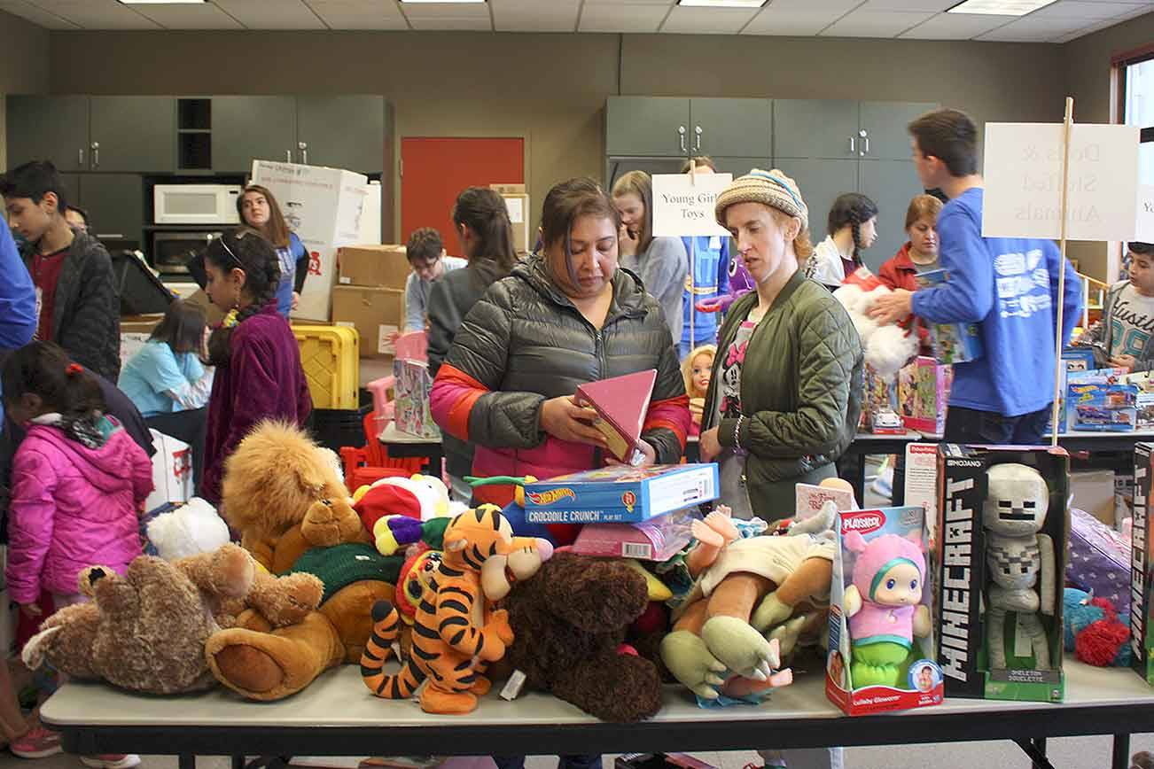 For the fifth year, HopeFest has offered low-income and homeless people with free groceries, clothes, hygiene items, toys, and books. Stephanie Quiroz/staff photo.