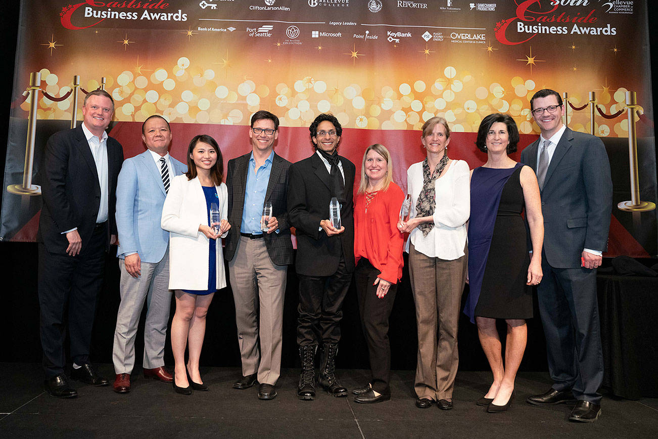 (Left to right) Josh Marti, co-founder and chairman of Point Inside; Jimmy Ng, vice president and senior business banking relationship manager of KeyBank; Zara Huang, Global Public Relations manager for Dragonchain; managing partner, Doug Bixel with FSorb; Shiraz Cupala, vice president of UX and Incubation at OfferUp; Theresa Larsen, investor relations officer for Jubilee REACH; Lindsey Hoffman, director of Business and Finance at Jubilee REACH; city of Bellevue deputy mayor, Lynne Robinson; and Joe Fain, president and CEO of the Bellevue Chamber of Commerce pose for a picture after the award ceremony. Mike Nakamura / courtesy photo