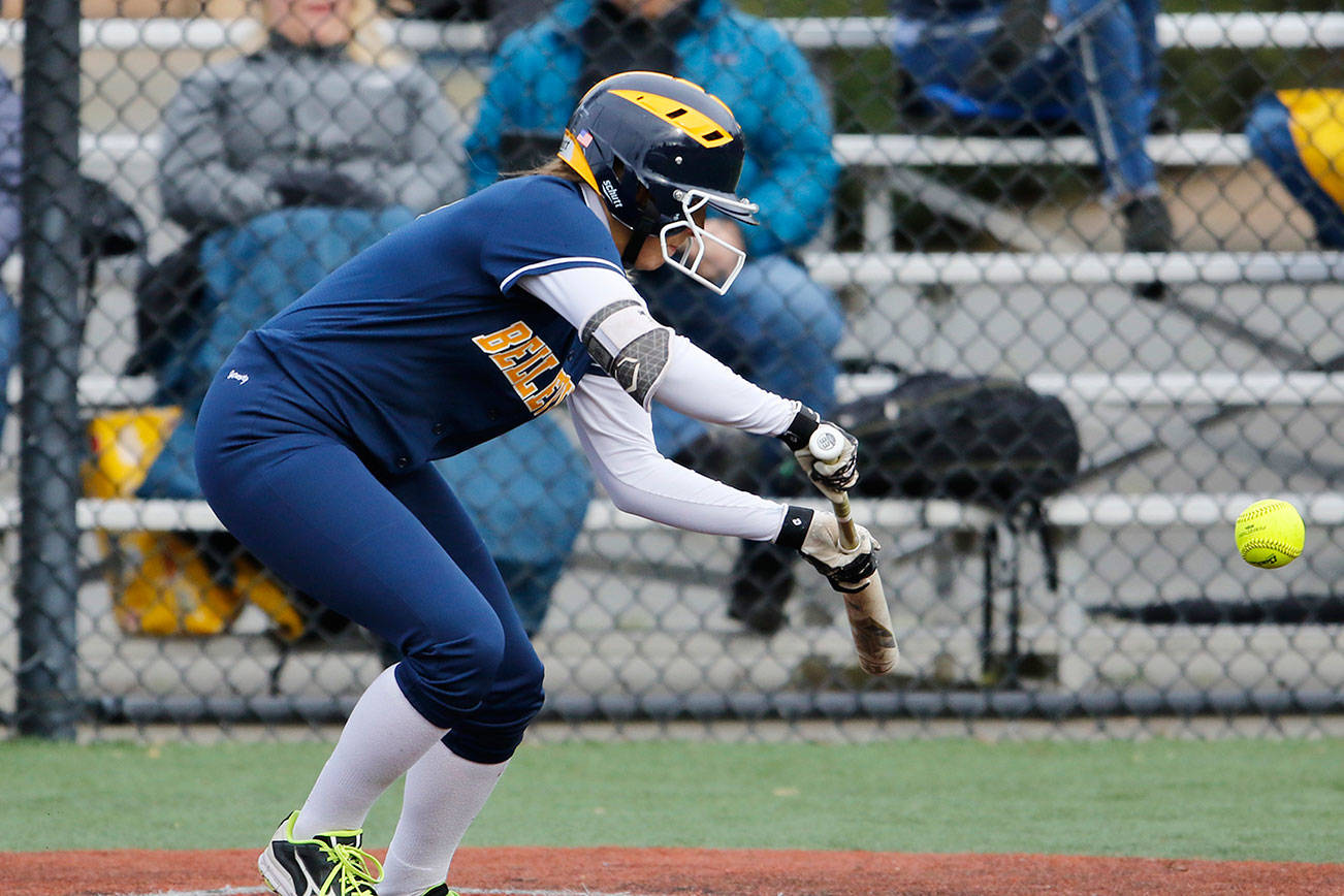 Bellevue Wolverines senior Montana Jones attempts to lay down a bunt against the Mercer Island Islanders in the top of the second inning on April 3. Jones finished the game with four hits against the Islanders. Bellevue earned a 35-0 victory against Mercer Island. Photo courtesy of Jim Nicholson