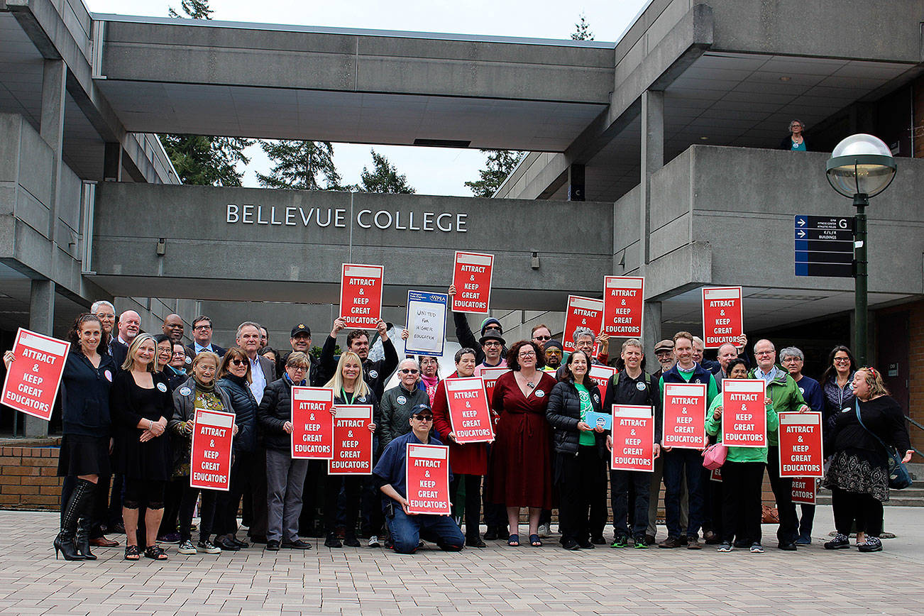 Madison Miller / staff photo                                BC staff and faculty rally for higher education funding in a posed photo on April 16.