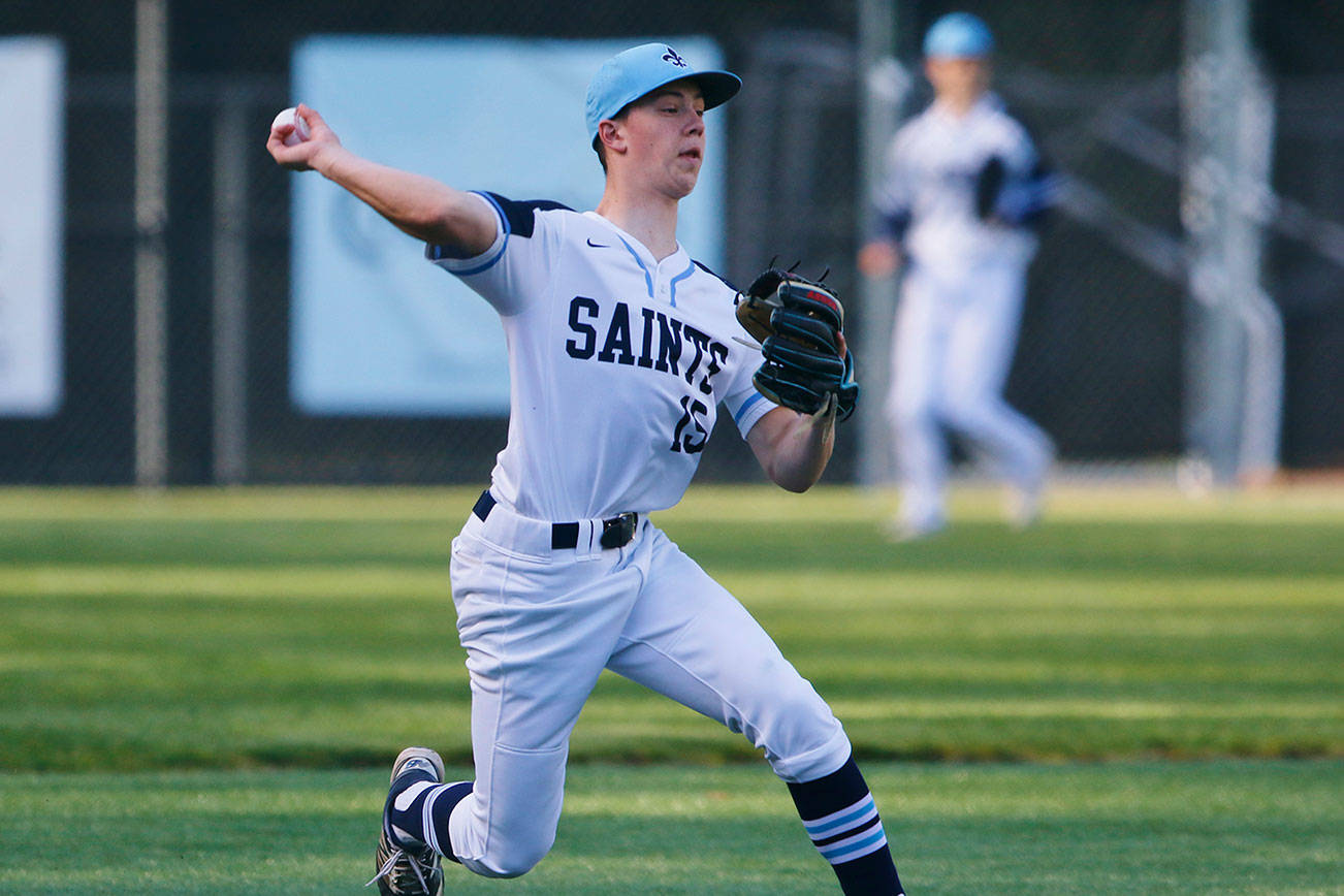 Interlake Saints third baseman Charlie Galanti throws a Mercer Island runner out after fielding a ground ball. Mercer Island defeated Interlake, 11-0, on April 17 in Bellevue. Photo courtesy of Jim Nicholson