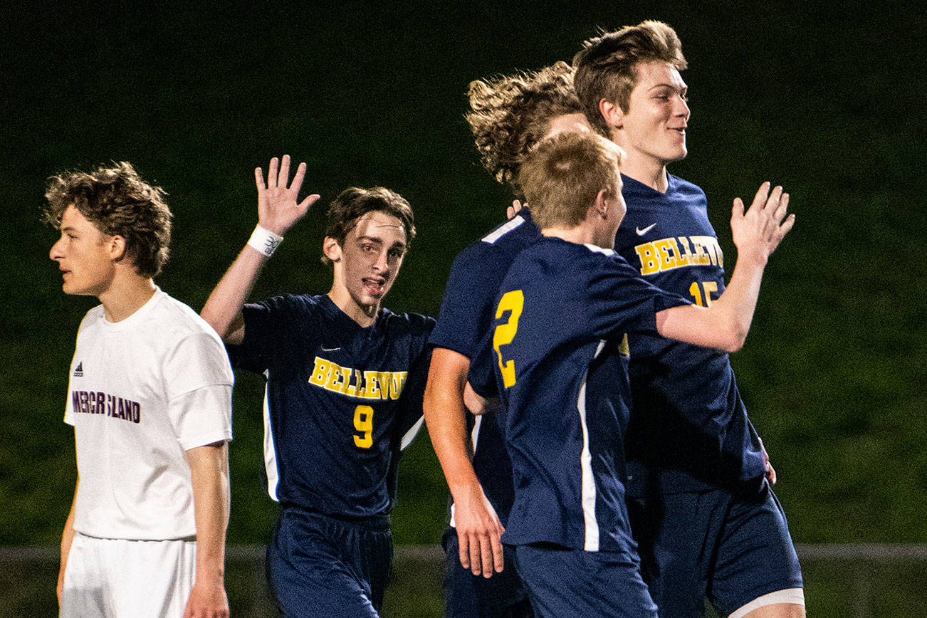 Bellevue players celebrate after Mason Wachter (No. 15) scored the only goal of the game against Mercer Island. Bellevue defeated Mercer Island 1-0 on May 2 in the final game of the 2019 regular season. Photo courtesy of Stephanie Ault Justus