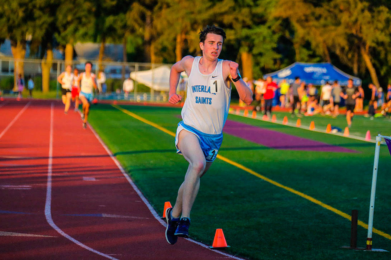 Interlake Saints senior Sebastian Brinkman (pictured) registered first-place finishes in the 1,600 and 3,200 at the 3A KingCo championship track meet at Lake Washington High School in Kirkland. Photo courtesy of Don Borin/Stop Action Photography