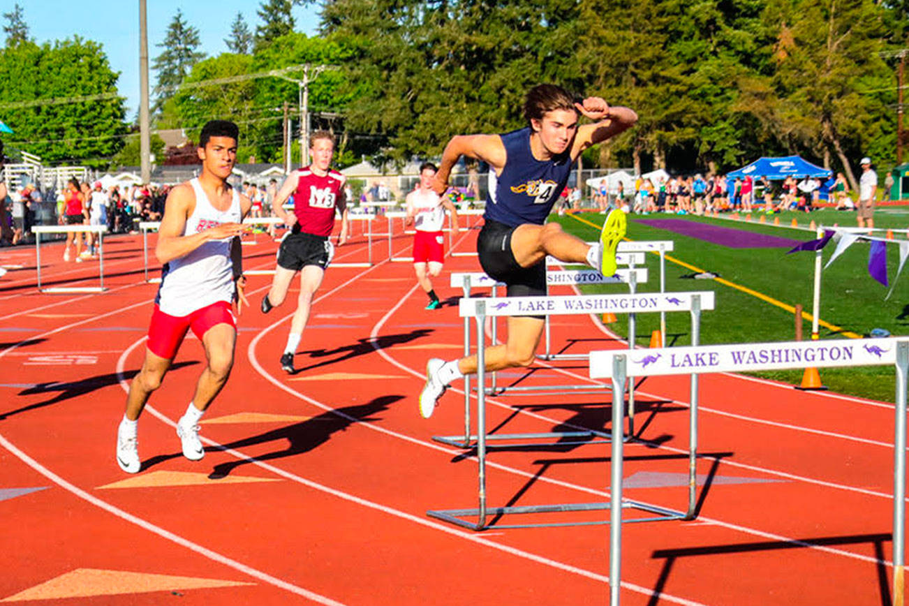 Colby Dash (pictured on right) finished in first place in the 300 hurdles and 110 hurdles at the 3A KingCo track meet at Lake Washington High School in Kirkland. Photo courtesy of Don Borin/Stop Action Photography