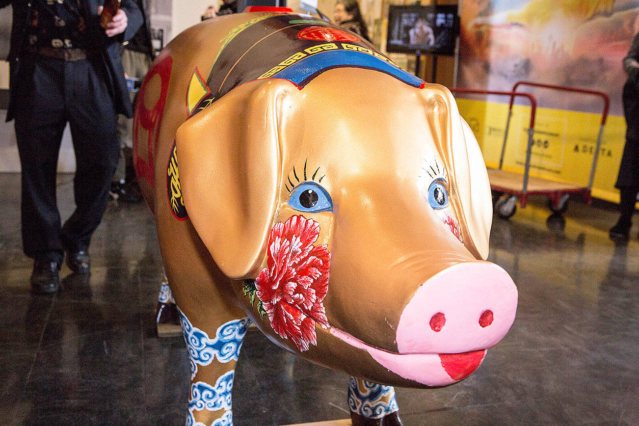 Zuolie Deng, a Seattle artist, created a Chinese version of a pig at his studio in Seattle’s Chinatown-International District. Photo courtesy of Market Foundation Twitter page.