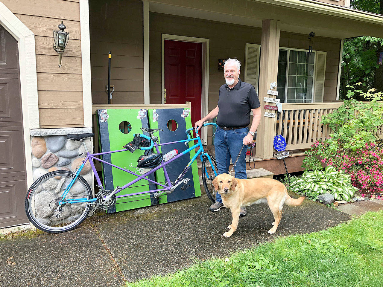 Stephanie Quiroz/staff photo                                Bellevue resident and blind cyclist Clark Roberts will be riding his tenth 206-mile Seattle to Portland bicycle ride in June.
