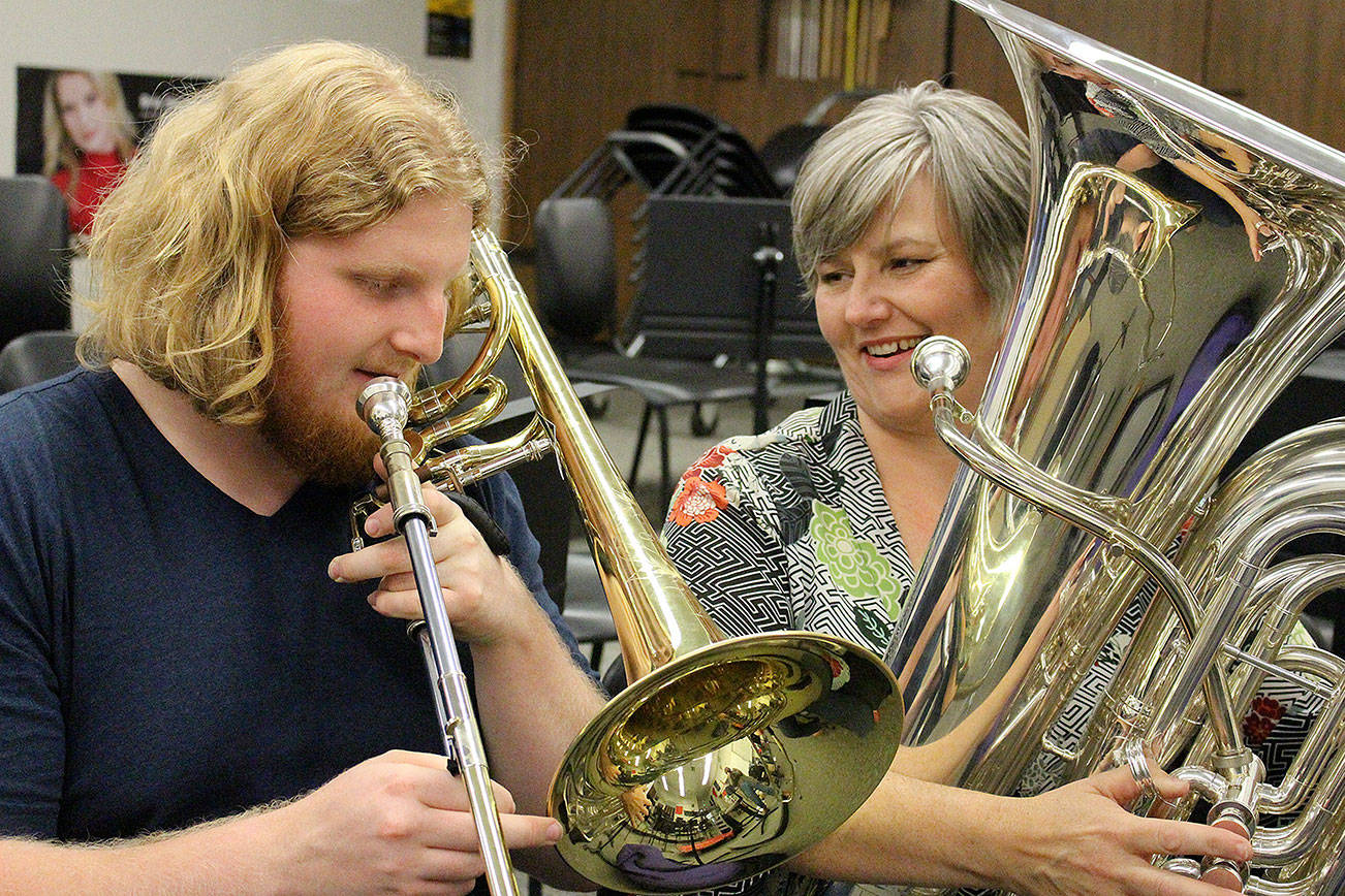Madison Miller / staff photo                                Erik Thurston and his mother, Lorraine, play in Brass Band Northwest.