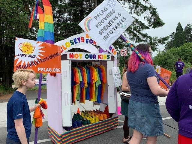 Photo courtesy of Beth Lenholt                                Members of PFLAG Bellevue Eastside march in this year’s Duvall Days parade earlier this month.