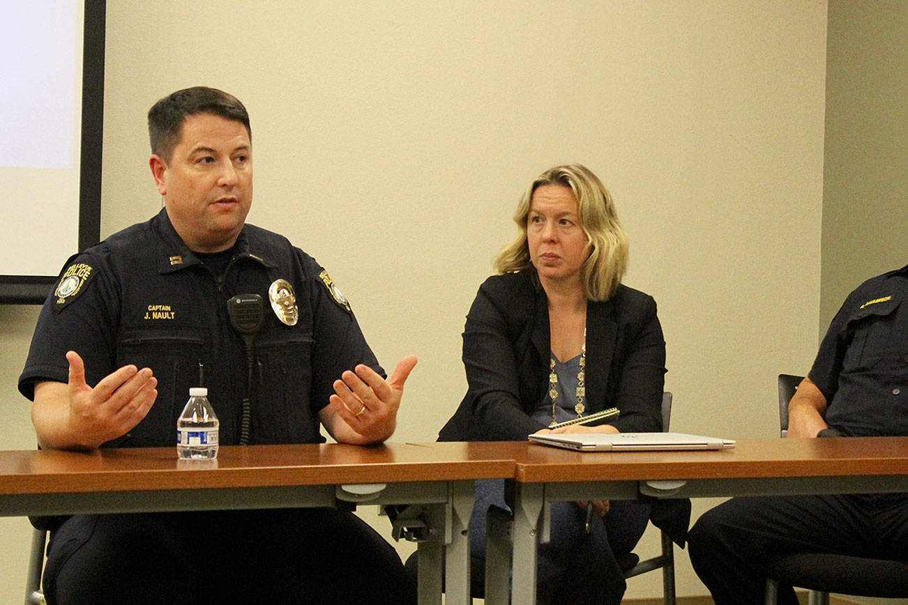 Blake Peterson/staff photo                                Bellevue North Sector Captain Joe Nault, Redmond Police Sergeant AnnMarie Fein and Issaquah Administrative Sergeant Ryan Raulerson were included on the panel.