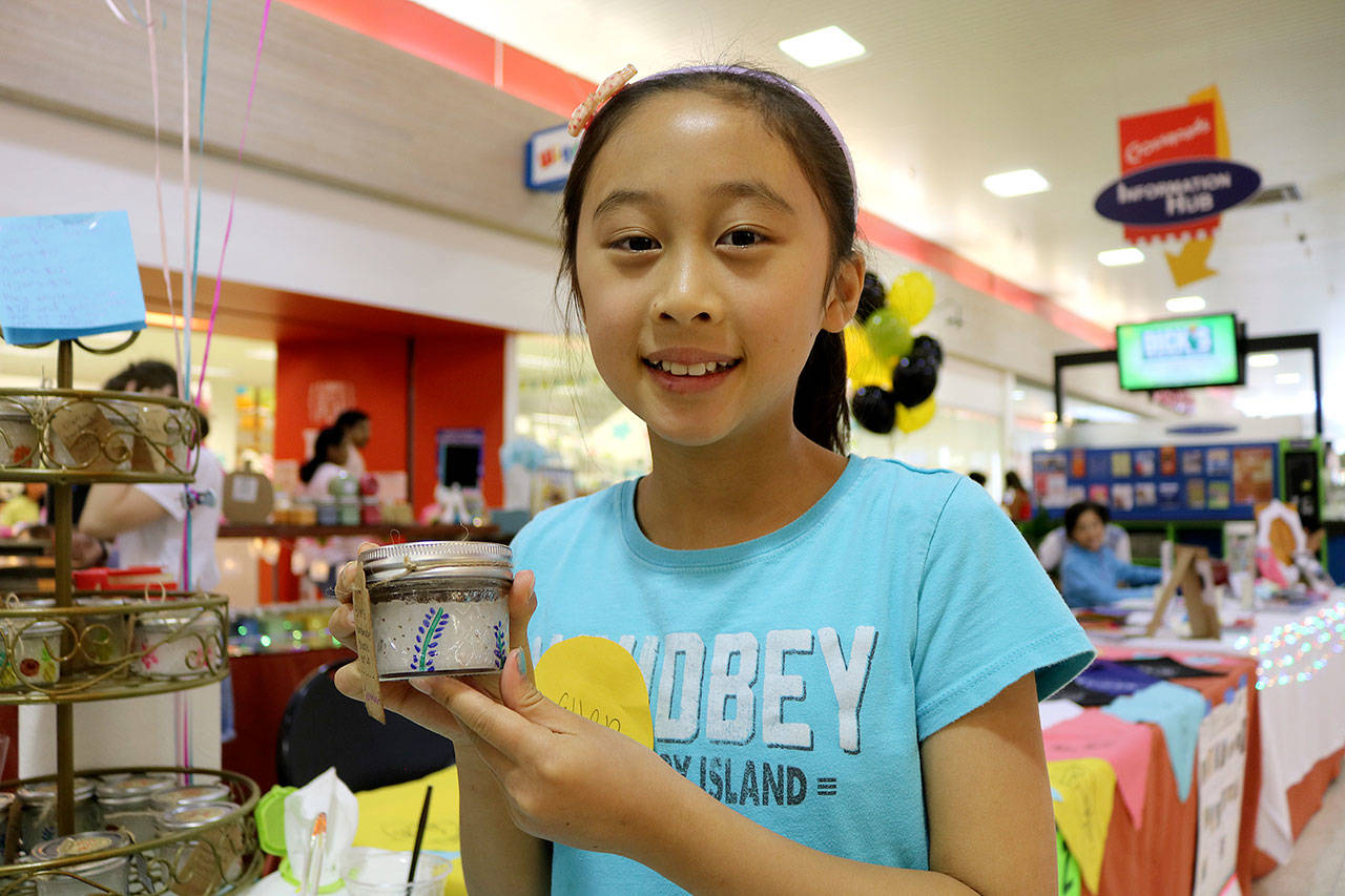Ellen Chang, 10, sold body scrubs at the business fair with her two friends. Their business, Happy Bubbles, sells all things bubble scrubs, bombs, and salts. Stephanie Quiroz/staff photo
