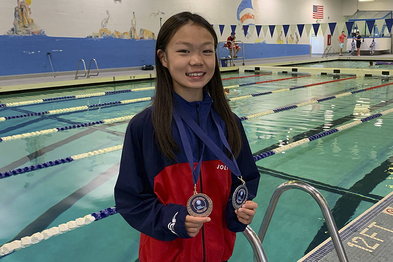 Synchronized swimmer reaches the podium