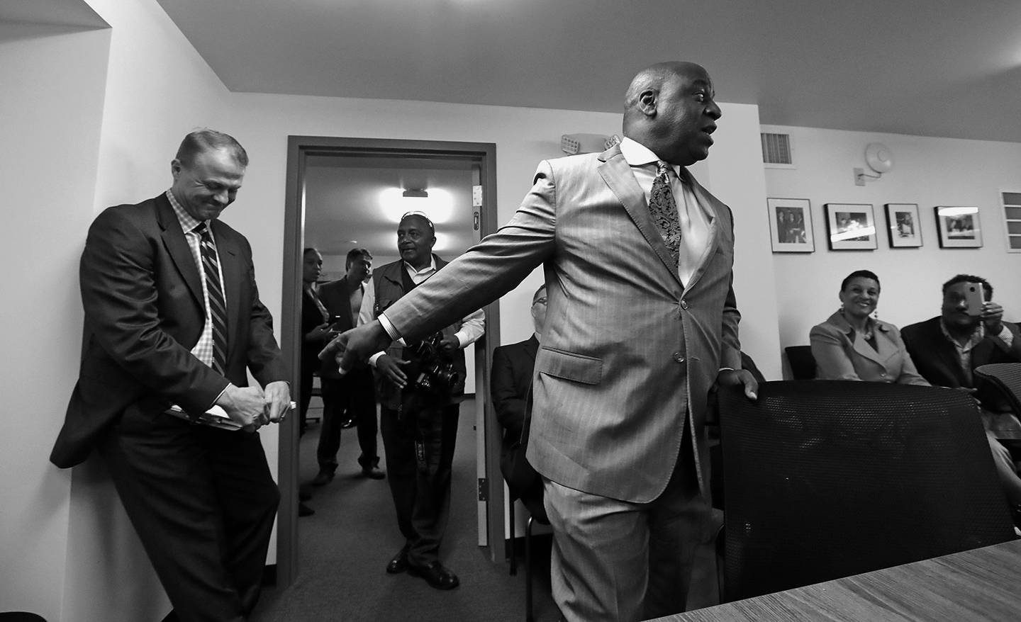 AP Photo/Elaine Thompson, file                                Former state Sen. Jesse Wineberry (right) playfully points out Tim Eyman behind him before a news conference on initiative I-1000, on Oct. 11, 2018, in Seattle.