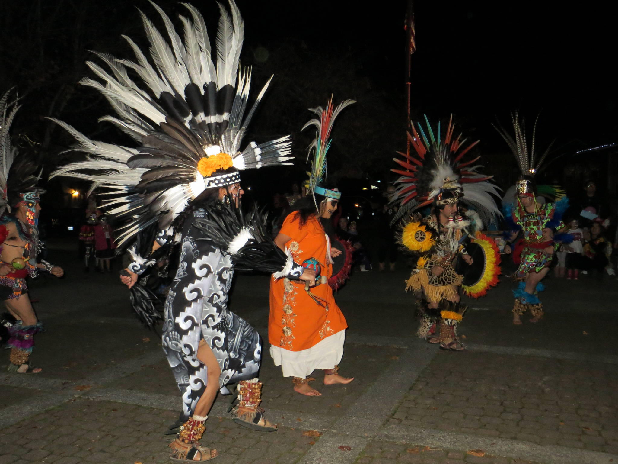 Traditional dancers perform at the Dia De Los Muertos celebration in downtown Issaquah.