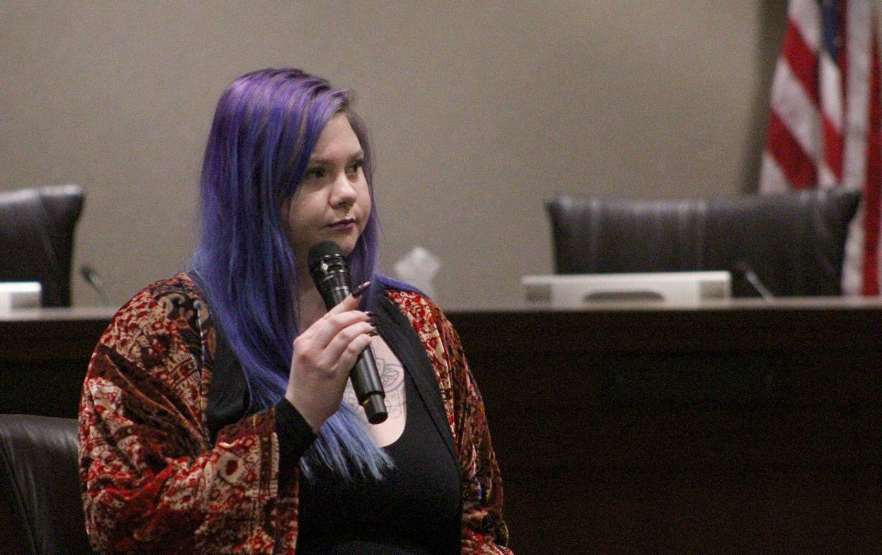 Chelsea Olsen, 27, answers questions from the crowd about her experience as a sex trafficking survivor at the Federal Way Coalition Against Trafficking forum on Jan. 16. Olivia Sullivan/staff photo