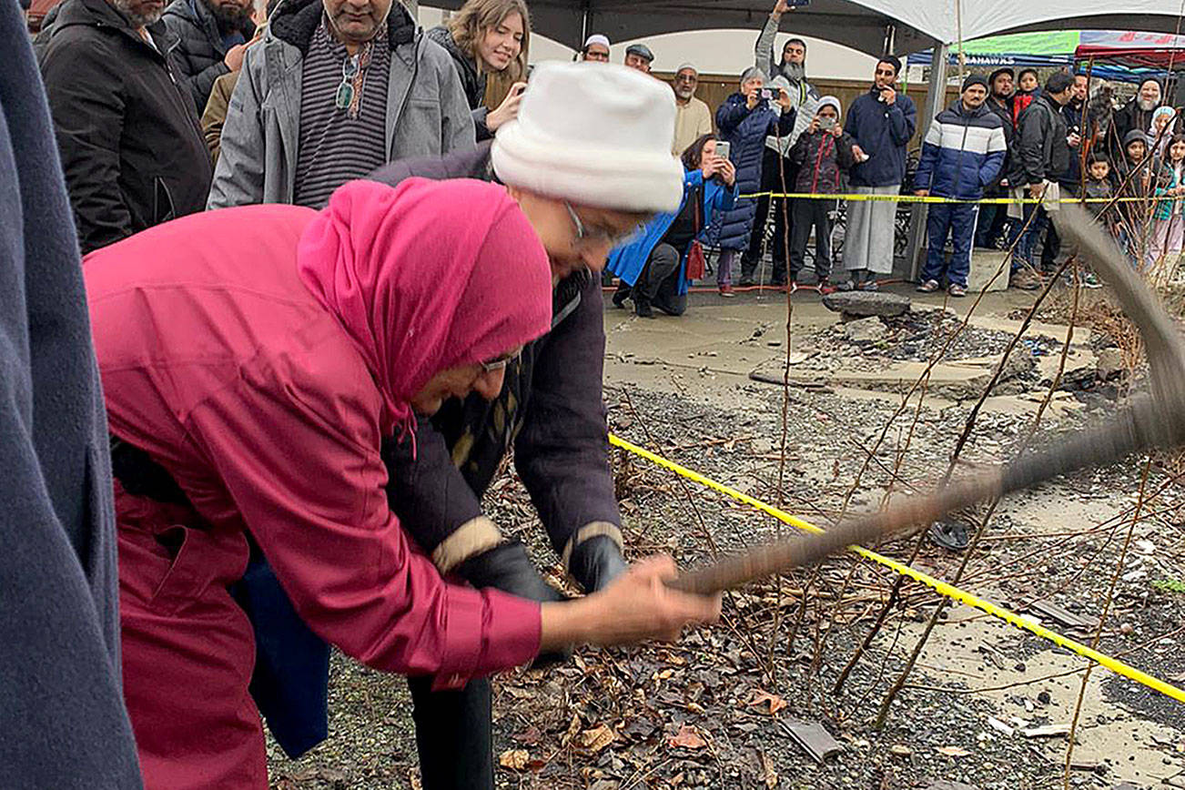 Photo courtesy ICOE                                Eastside Interfaith Social Concerns Council member Farida Hakim and Susan Wilson of the Church of Jesus Christ of Latter-day Saints at the groundbreaking.