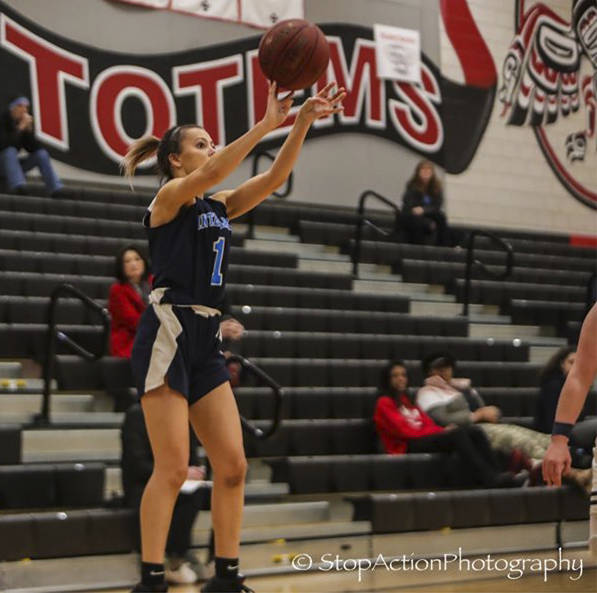 Interlake senior Gretchen Dayment takes a shot during the Saints’ 47-41 loss to Bellevue on Feb. 11 at Sammamish High School. Photo courtesy of Don Borin/Stop Action Photography