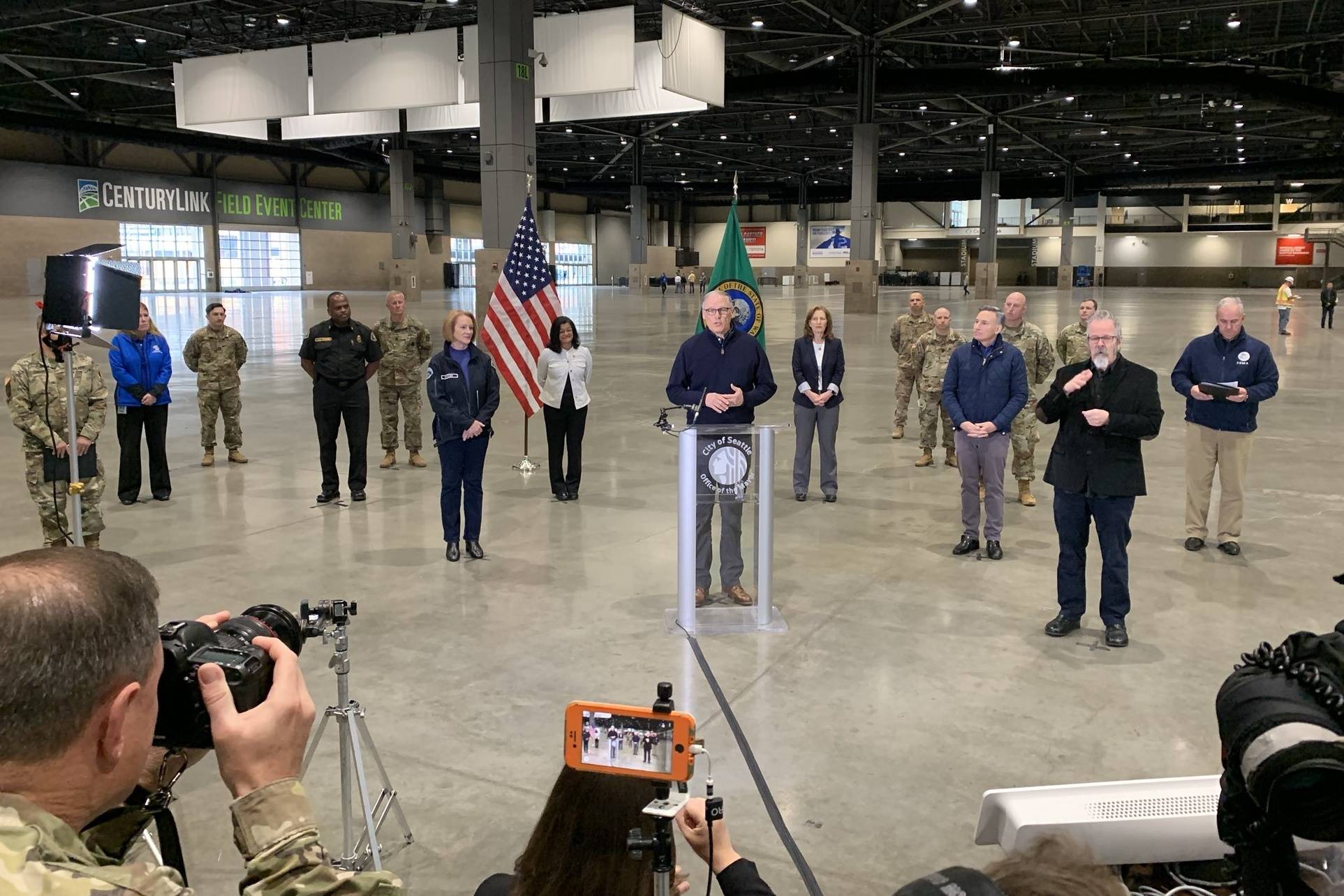 Gov. Jay Inslee is pictured March 28 at a field hospital set up at the CenturyLink Field Event Center to address non-COVID-19 medical needs. (Photo courtesy of Jay Inslee’s Twitter feed)