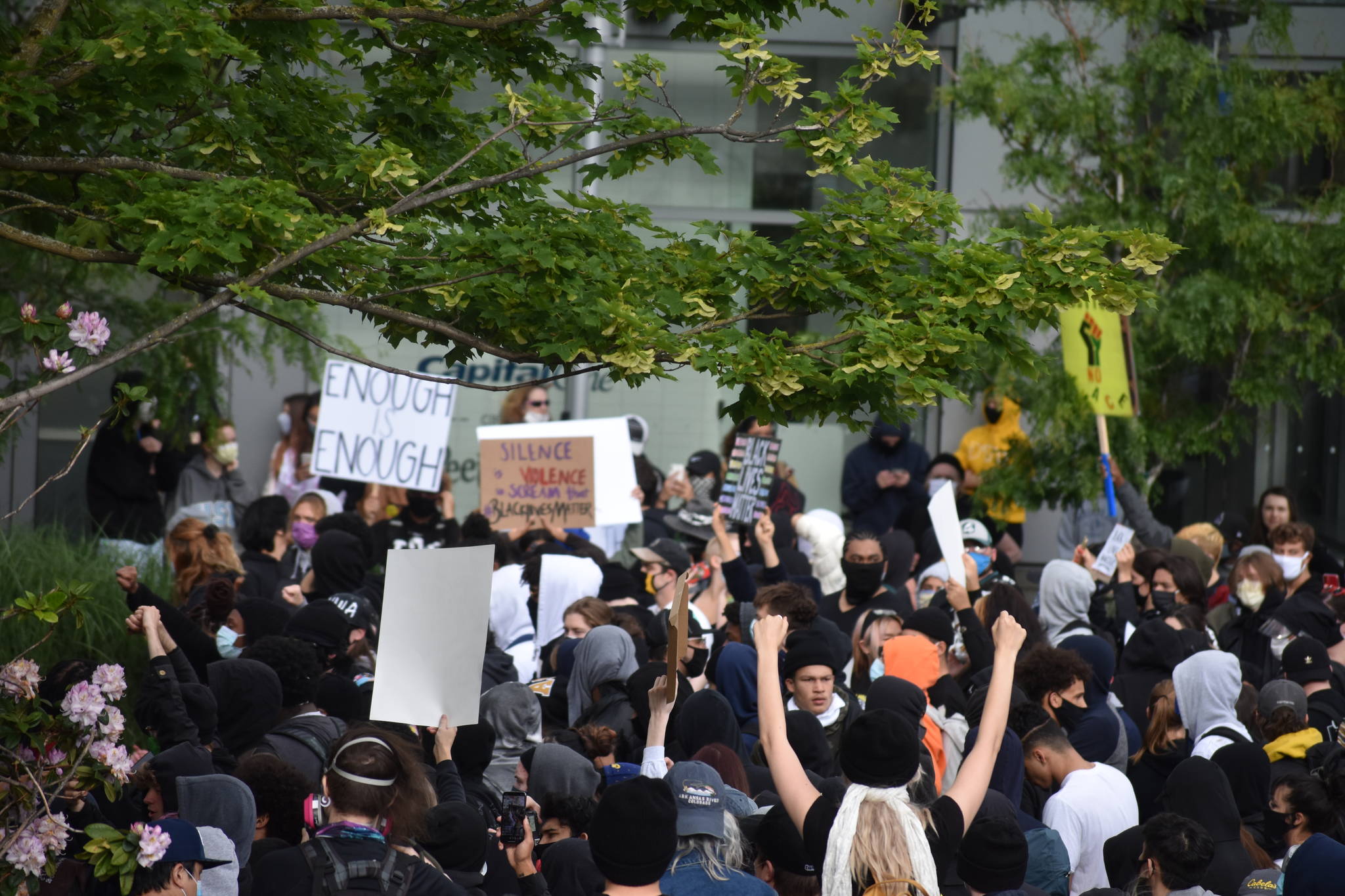 Roughly 300 protesters in downtown Bellevue, Sunday, May 31. Photo by Haley Ausbun/Sound Publishing