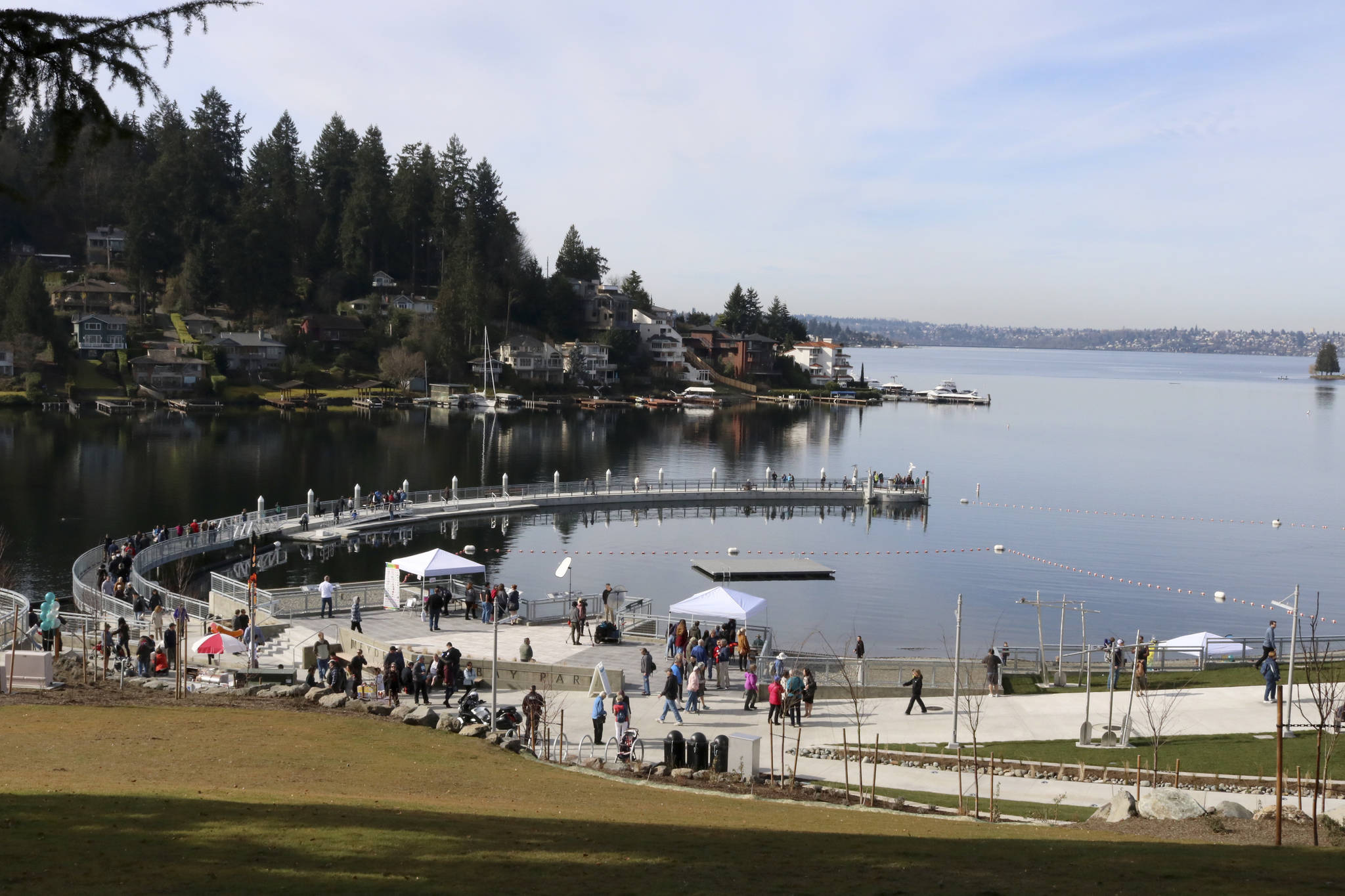 Bellevue residents explore the new pier at Meydenbauer Bay Park during the grand opening event. File photo 2019.