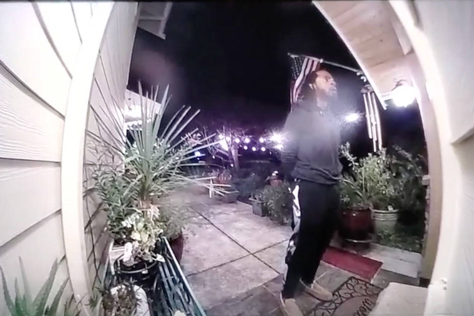 Screenshot of video obtained by Redmond police shows Richard Sherman trying to break into the Redmond home of his in-laws.