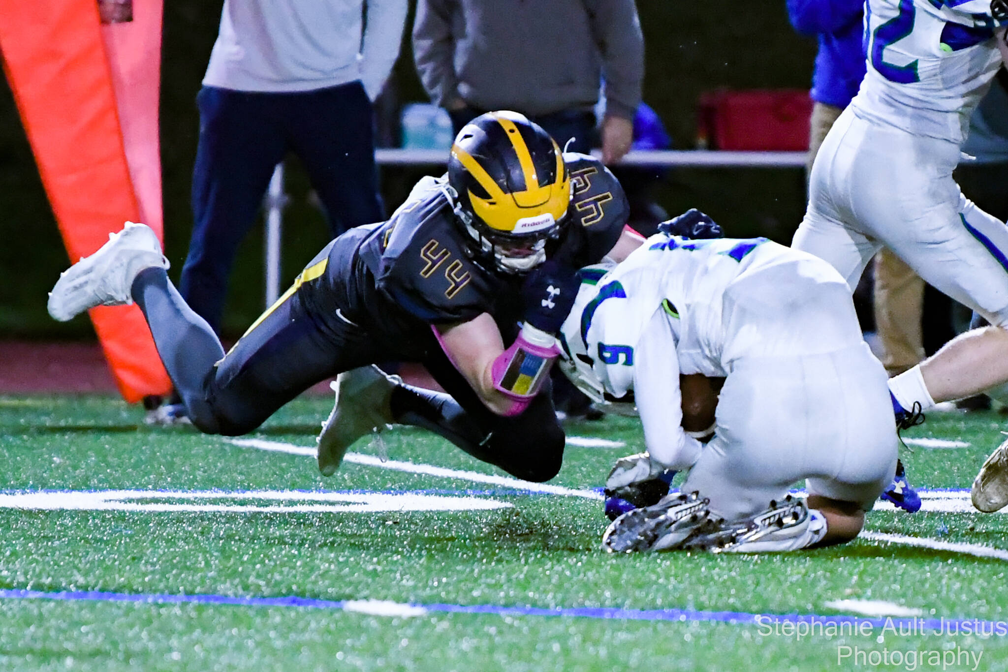 Bellevue’s George Kruger tackles Liberty’s Nathan Moffitt. Bellevue is 4-0 in 3A KingCo and 7-0 overall. Photo courtesy of Stephanie Ault Justus