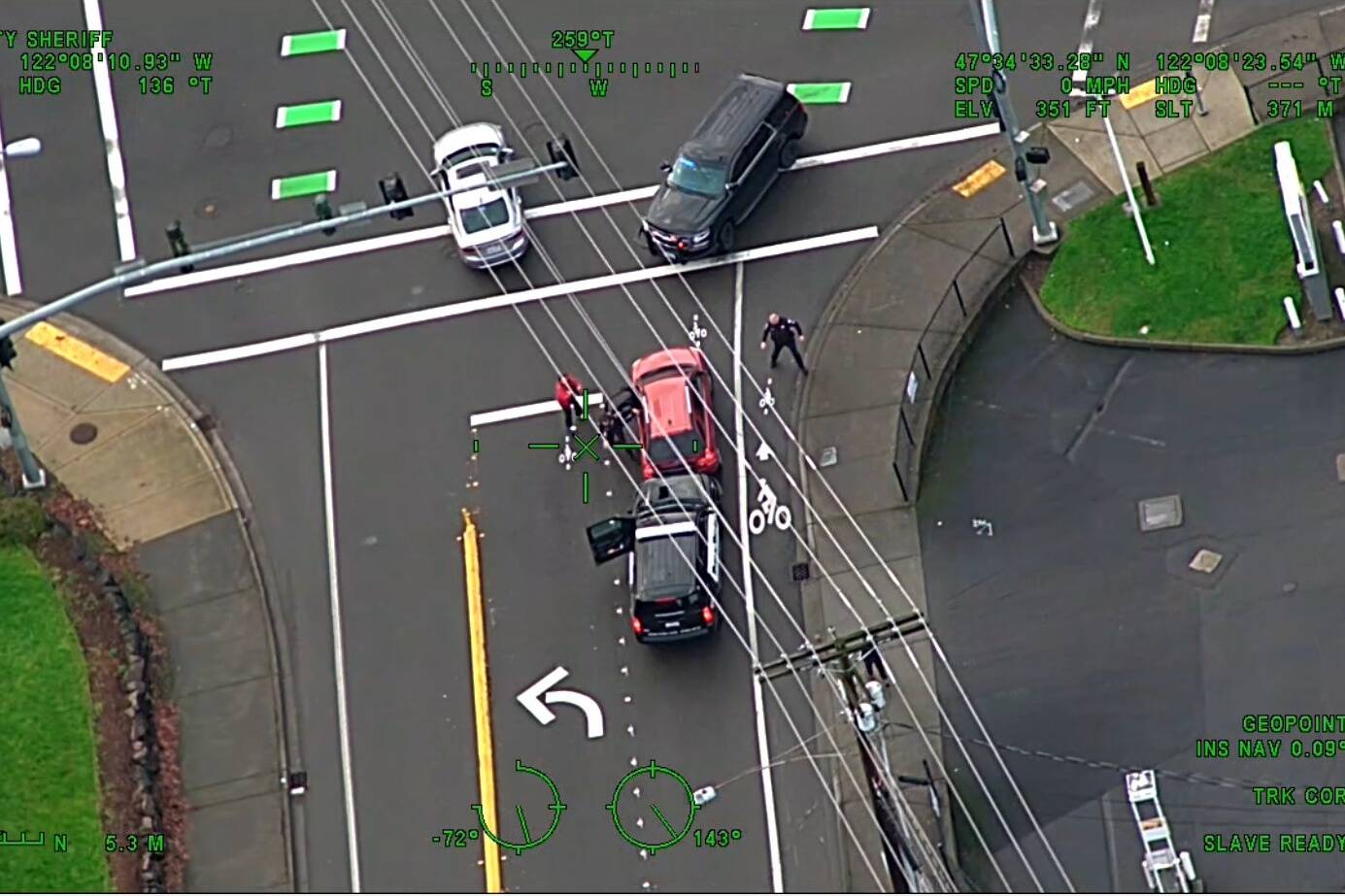 Guardian One footage from January 2022 shows an Issaquah police officer attempting to remove suspect from stolen vehicle but gets run over in the process. Courtesy of King County Sheriff’s Office Air Support