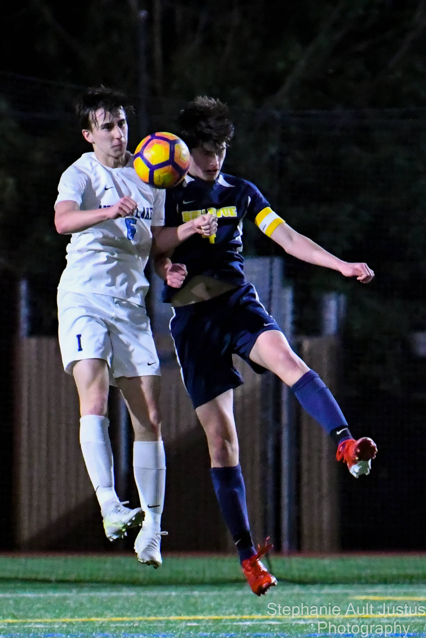 Interlake junior Luke Hilton (#6) goes for the ball against Bellevue senior Johnny Schultz (#4). Courtesy of Stephanie Ault Justus.