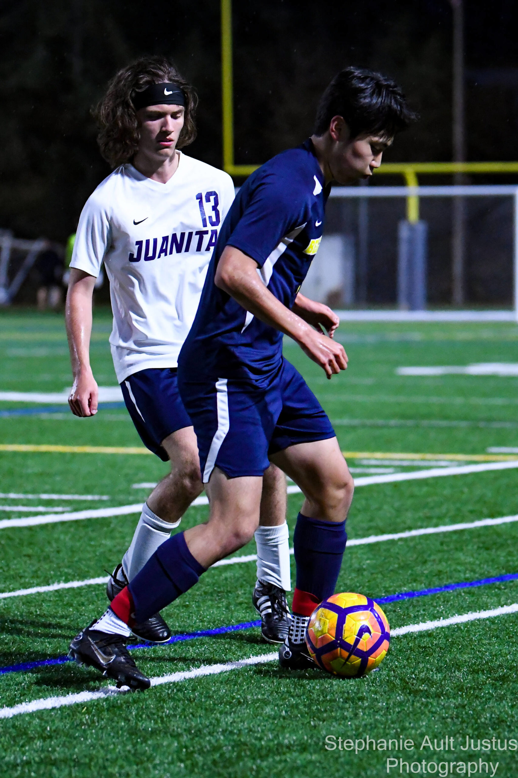 Alex Cho (#7) dribbles the ball past Ryan Saal (#13). Courtesy of Stephanie Ault Justus.