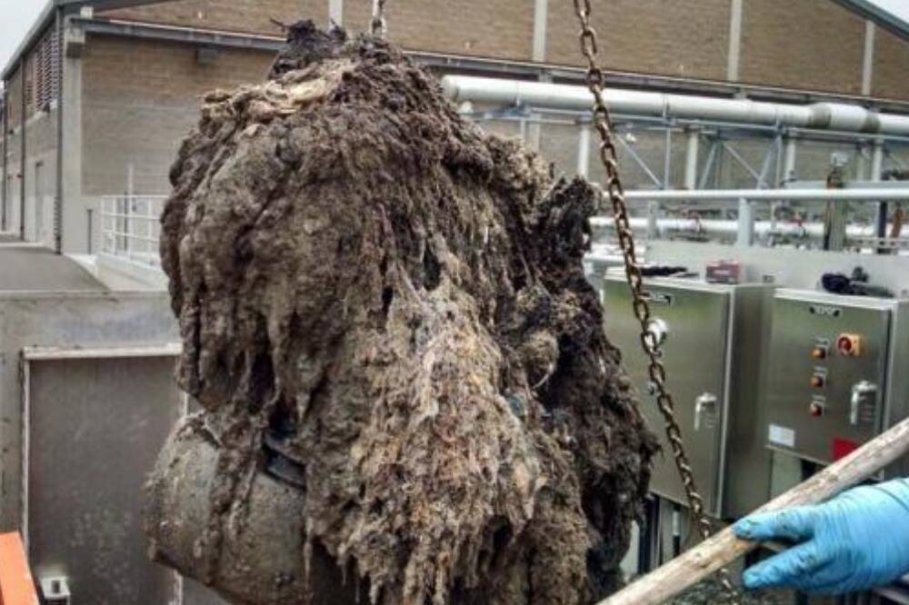 A pipe-clogging fatberg being removed (Screenshot from Washington Association of Sewer & Water Districts website)