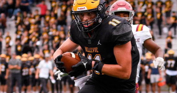 Bellevue High School's junior and tight end, Hogan Hanson (#11), scores a touchdown. Courtesy of Stephanie Ault Justus.