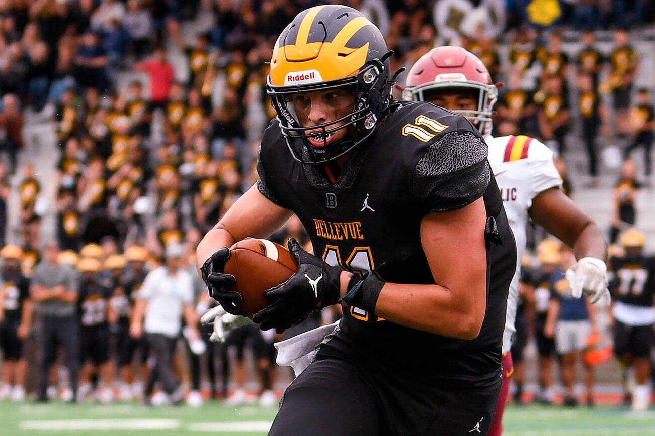 Bellevue High School's junior and tight end, Hogan Hanson (#11), scores a touchdown. Courtesy of Stephanie Ault Justus.