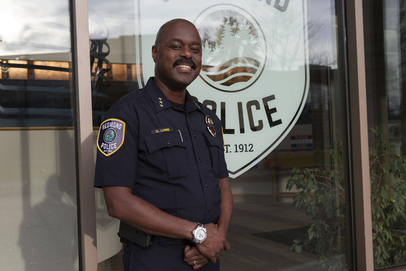 Redmond’s new police chief Darrell Lowe stands outside the Redmond Police Department on Nov. 13. Lowe comes from Santa Monica PD, where he spent 27 years serving. Staff photo/Ashley Hiruko