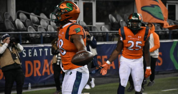 Sea Dragon WR Jordan Veasy celebrates and looks at the home fans after he scored the go ahead touchdown Feb. 23. Photos by Ben Ray/Sound Publishing