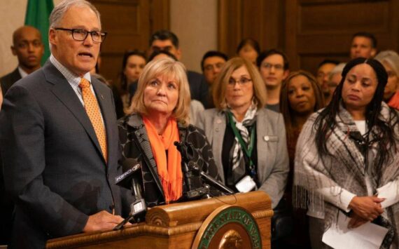 Gov. Jay Inslee, left, with First Lady Trudi Inslee at a press conference advocating for laws to prevent gun violence. (Provided by the Washington State Governors’ Office)