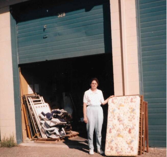 Karen Ridlon stands next to the first storage unit donated to her in Issaquah. (Photo courtesy of KidVantage)
