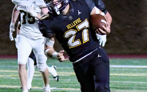 Bellevue senior #27 Blake Teets, who ran for a touchdown in this picture. Photo Credit: Stephanie Ault Justus