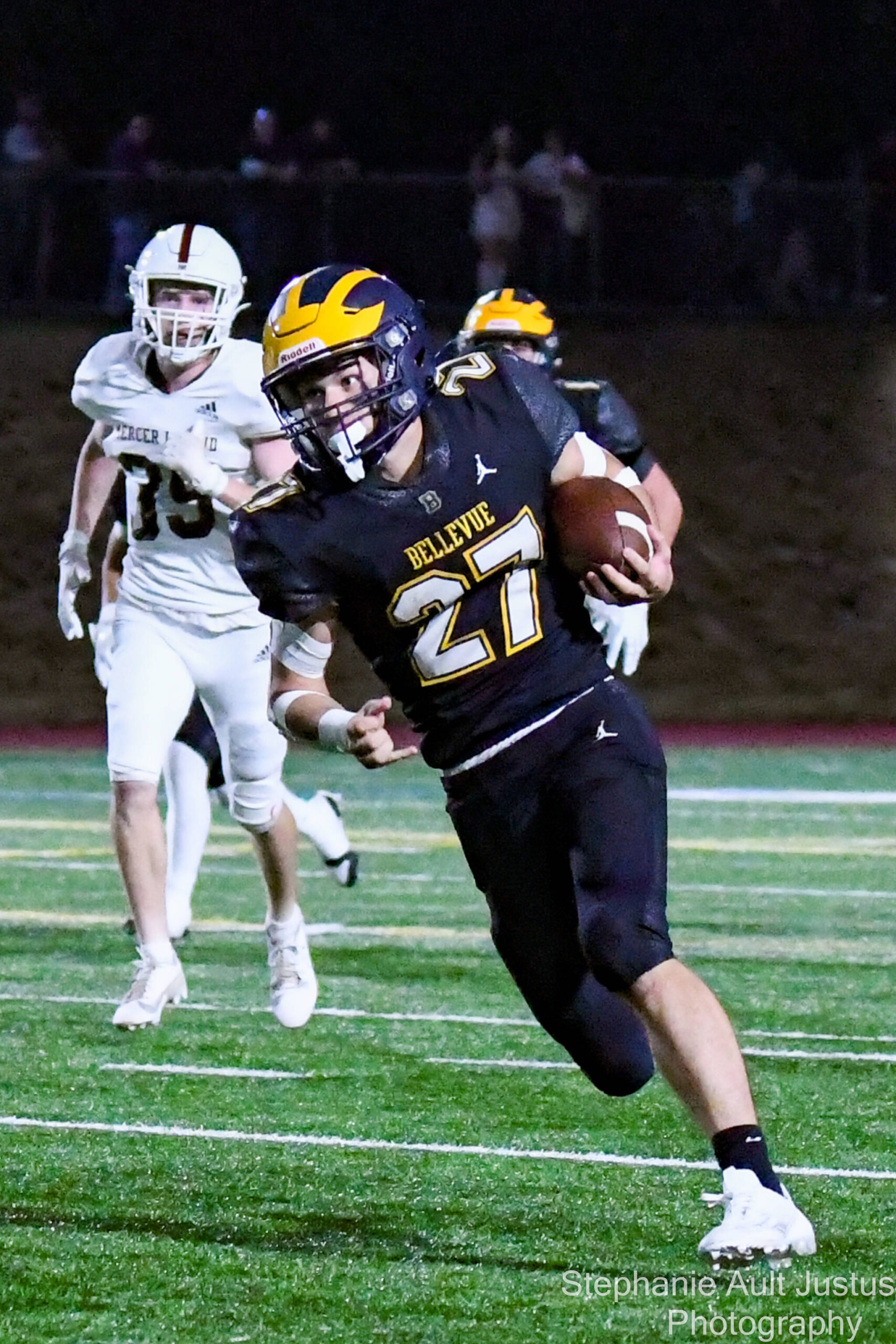 Bellevue senior #27 Blake Teets, who ran for a touchdown in this picture. Photo Credit: Stephanie Ault Justus