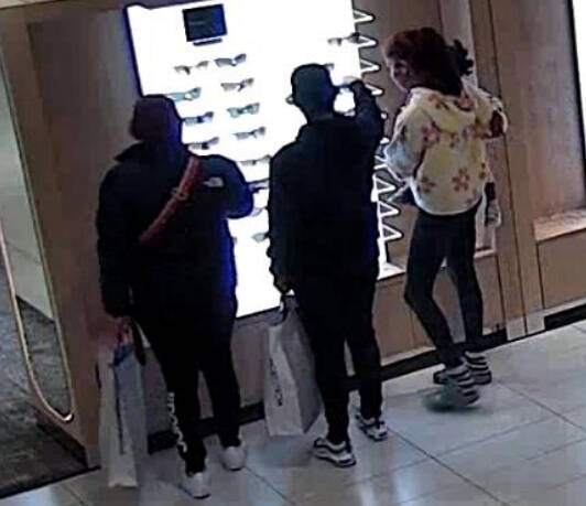 According to the Bellevue Police Department, the suspects would enter the store as a group, steal sunglasses, and conceal them in their clothing and bags before leaving. (Courtesy of court documents.)