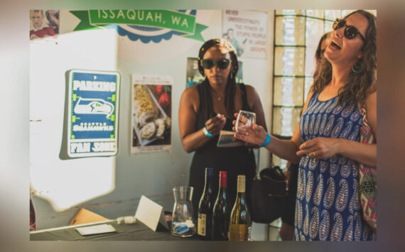 Each participating business hosts a winery and an artist, creating a walking tour of art and wine. Photo courtesy of Downtown Issaquah Association.