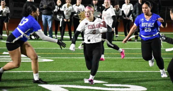 Kentlake junior Kaylee Guiles finds a hole in against Kent-Meridian. Ben Ray / The Reporter