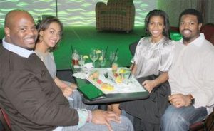 Seahawks player Floyd Womack (left) and his wife