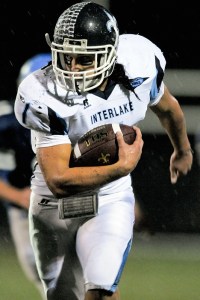 Saints RB Brett Kirschner breaks loose for a gain against North Mason during a 2A playoff game at Curtis High School in Tacoma on Tuesday.