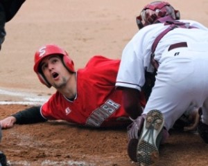 Sammamish junior Brett Berky reacts to the umpires out call during an attempted steal of home Wednesday against Mercer Island. The Totems lost 2-1.