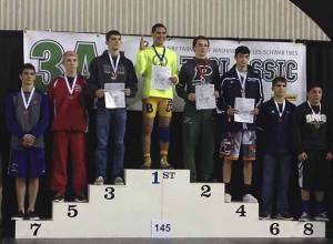 Bellevue's Christian Villani on the podium after his second straight state title.