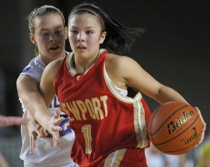 Knights Chanel Cambronero (1) drives against a Puyallup defender during 4A state tournament play at the Tacoma Dome on Thursday.