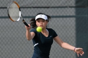 Bellevue's London Lee returns a volley during singles play Thursday against Bothell's Nicole Henderson. Lee beat Henderson 6-1