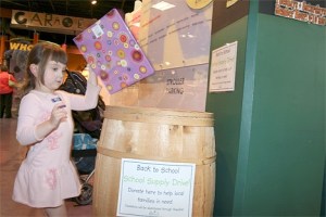 Sarah Rose Bright donates to KidsQuest Children's Museum Back to School Drive.