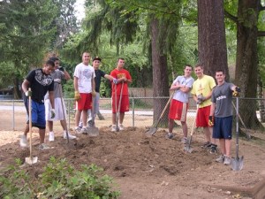 Fifteen members of the Newport High School's Varsity Football Team pitched in a helping hand on Aug. 8 for the annual Knights Give Back community service project.